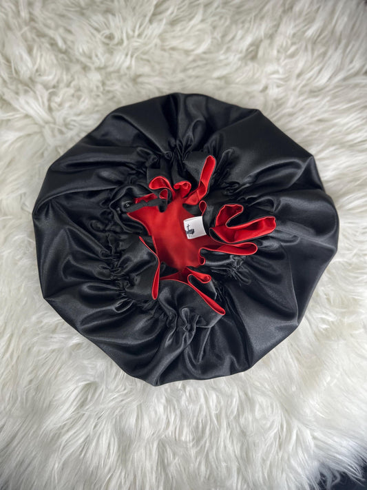 Handmade reversible satin bonnet in black and red with an adjustable clasp for custom fit by mariebeauteeco