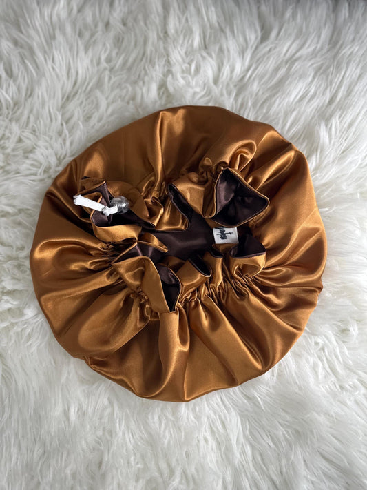 Handmade reversible satin bonnet in brown and gold with an adjustable clasp for custom fit by mariebeauteeco