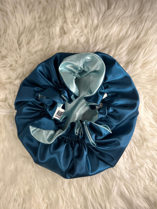 Handmade reversible satin bonnet in teal and seafoam with an adjustable clasp for custom fit by mariebeauteeco