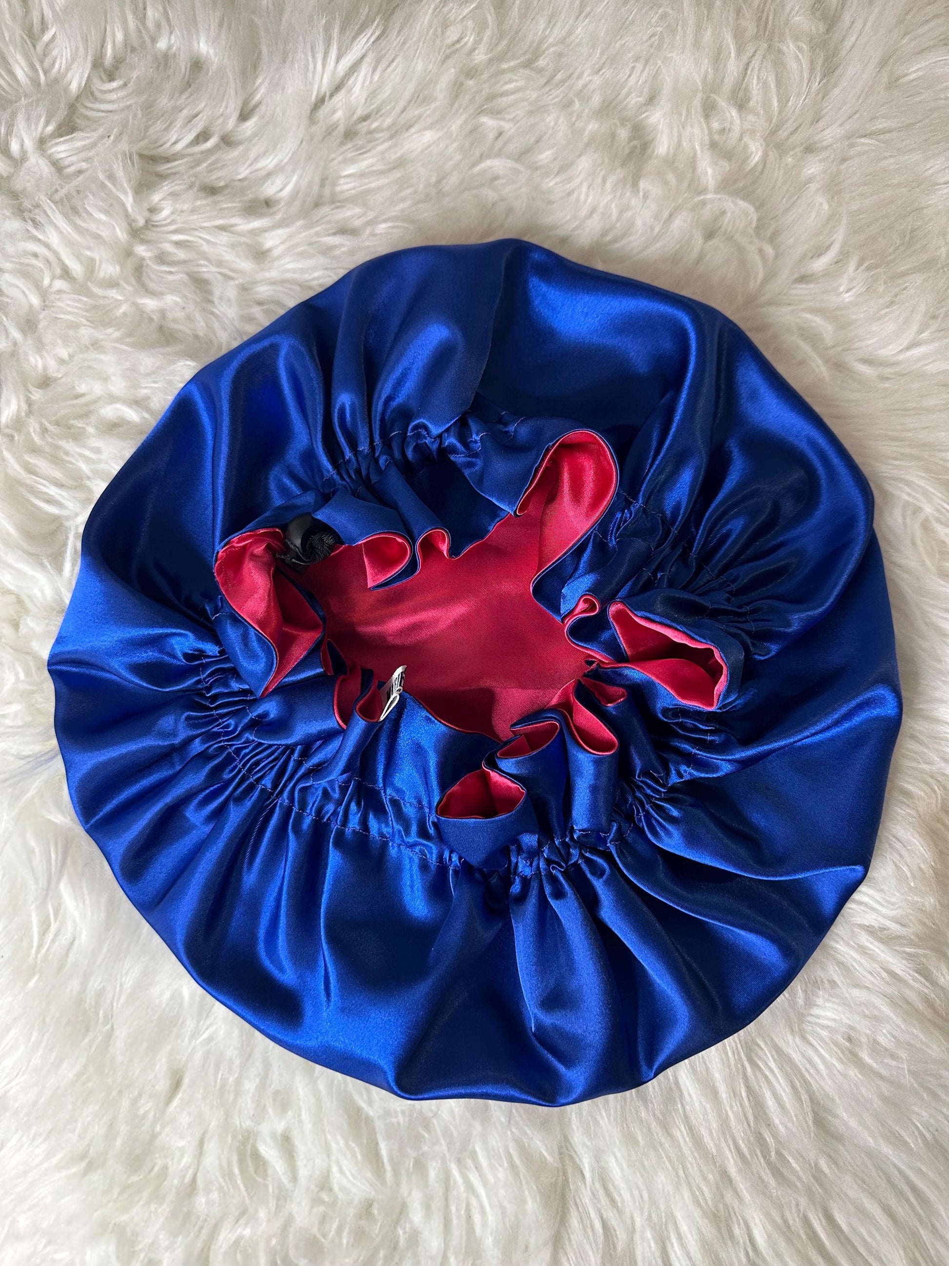 Handmade reversible satin bonnet in blue and pink with an adjustable clasp for custom fit by mariebeauteeco