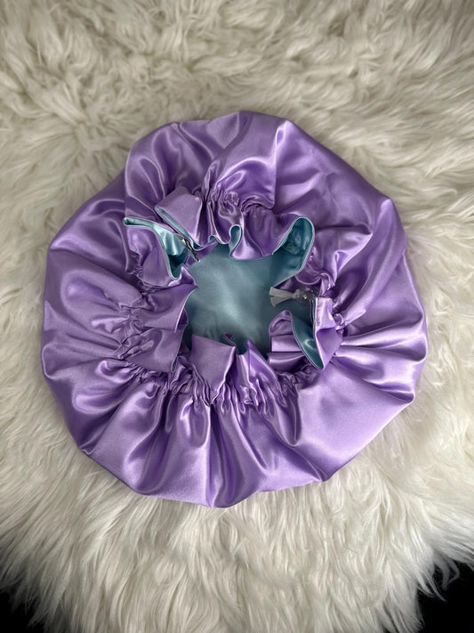 Handmade reversible satin bonnet in lavender and seafoam with an adjustable clasp for custom fit by mariebeauteeco