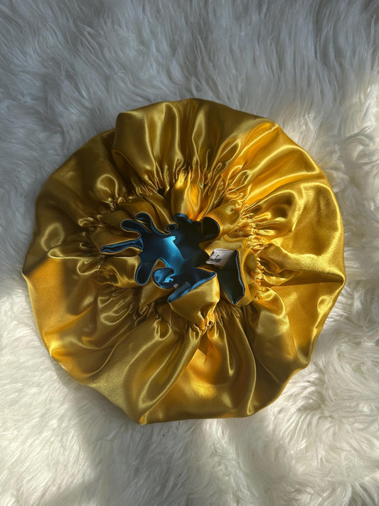 Handmade reversible satin bonnet in yellow and blue with an adjustable clasp for custom fit by mariebeauteeco